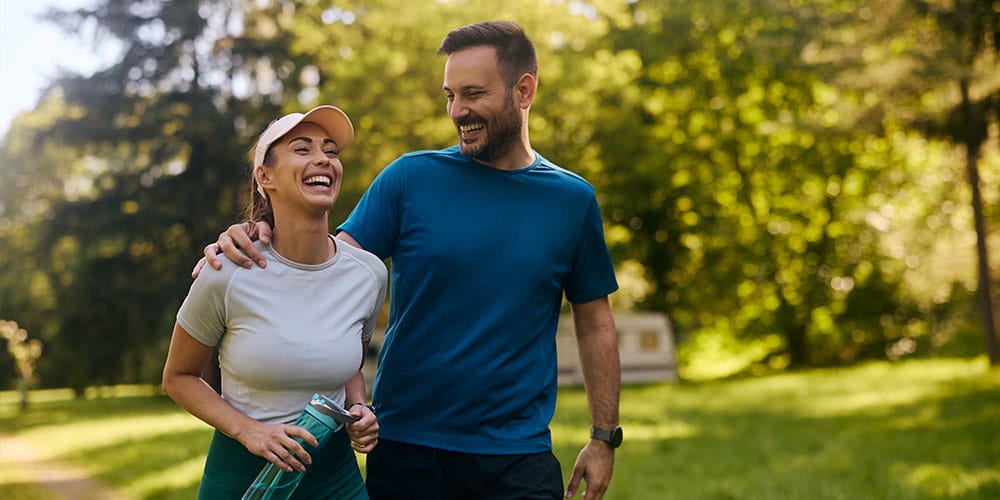 Denver couple working out together after using integrative and holistic medicine techniques