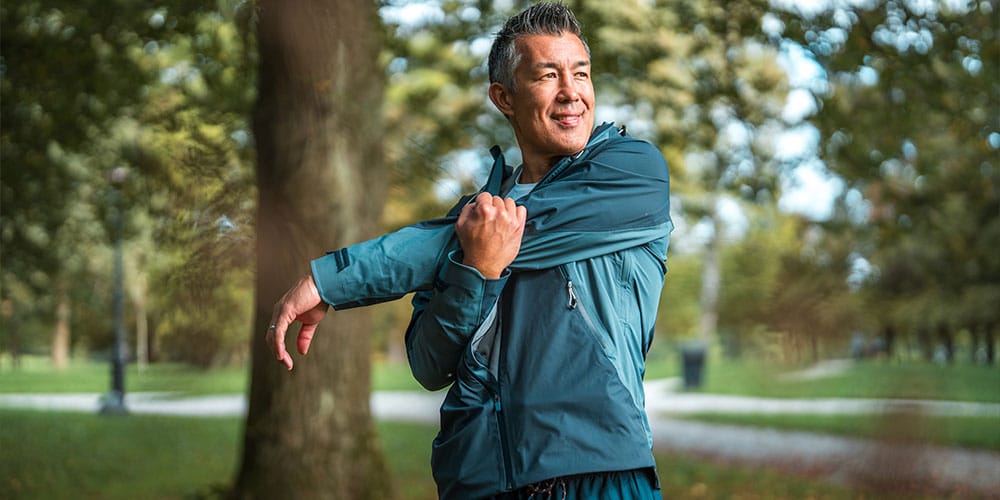 older man working out in Denver after starting peptide therapy