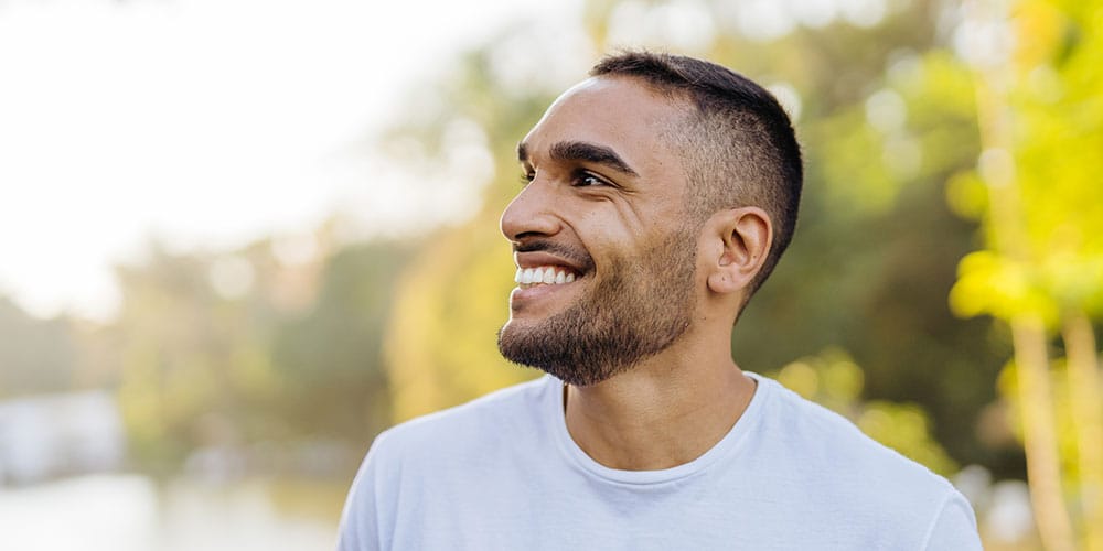 man smiling after getting the P-Shot in Denver